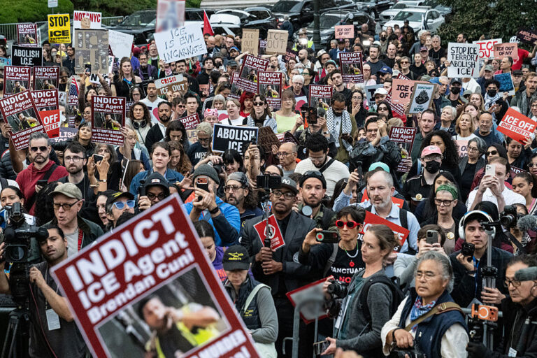 People participate in a rally against ICE activities. ICE agents shot a 28-year-old man, Oscar Belgal, during an attempted arrest in the Marble Hill neighborhood of the Bronx. (Stephanie Keith / Getty Images)