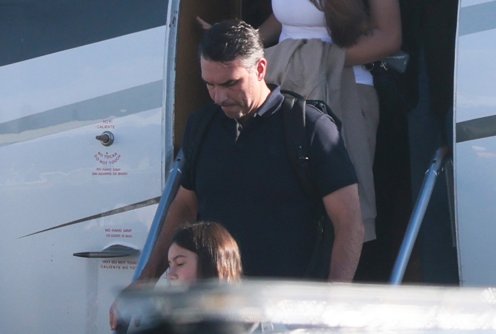 Brazilian presidential candidate Flavio Bolsonaro (C) arrives at Miami-Opa Locka Executive Airport with his family on October 28, 2026 in Miami, Florida. (Photo by Joe Raedle/Getty Images)