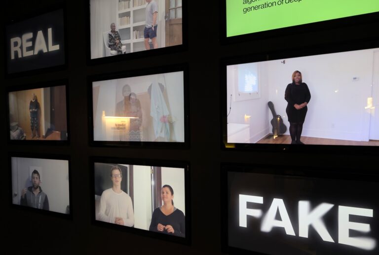 The MIT Museum’s exhibit “AI: Mind the Gap” looks at deepfake video technology. (Photo by Lane Turner/The Boston Globe via Getty Images)